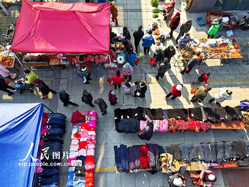 江西贛江新區 周末集市年味濃，日用百貨聚鄉情